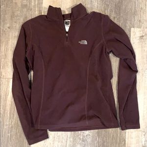 purple north face zip up/pull over, runs small